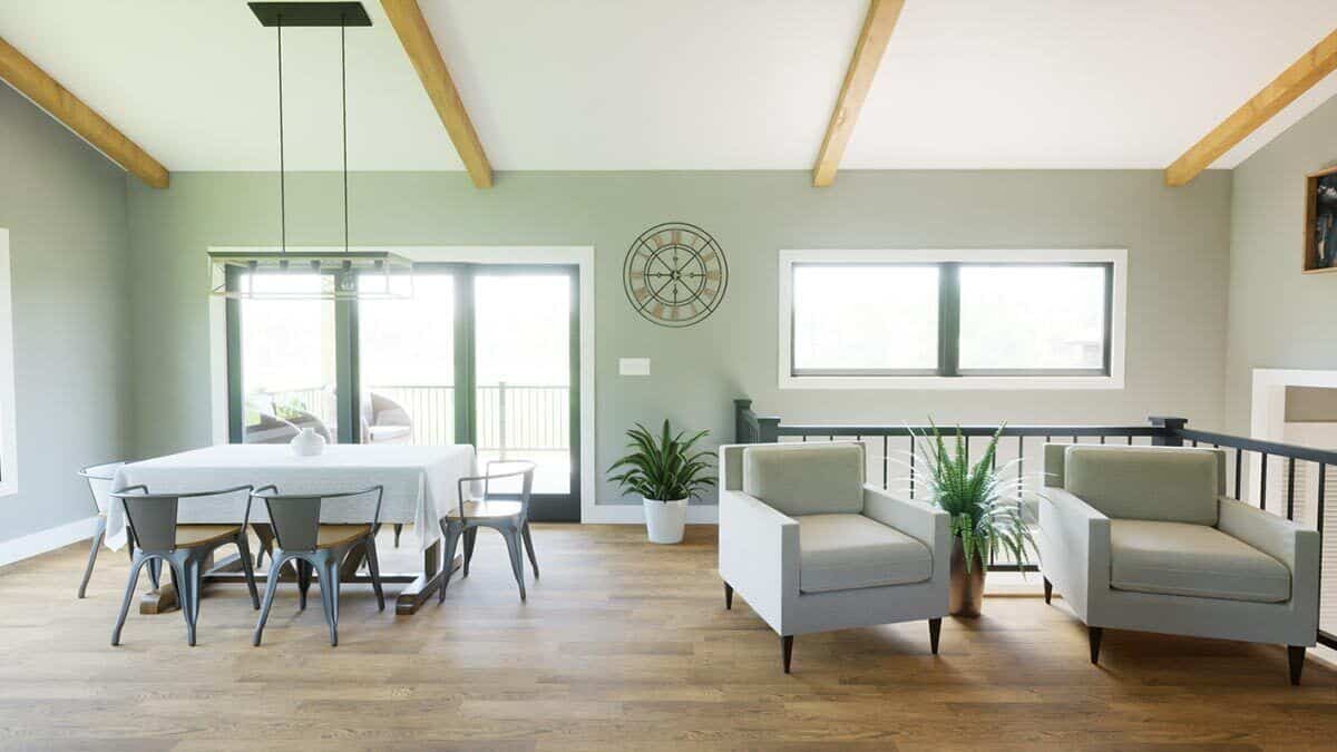 Dining area with a contemporary dining set and sliding glass doors that open onto the rear patio.