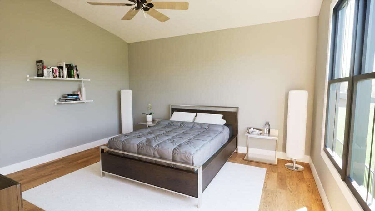 Primary bedroom with a dark wood bed and floating shelves fixed against the gray walls.