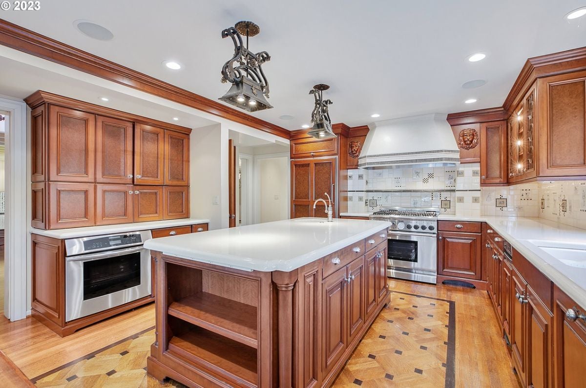 Kitchen with custom lighting and custom cabinetry.