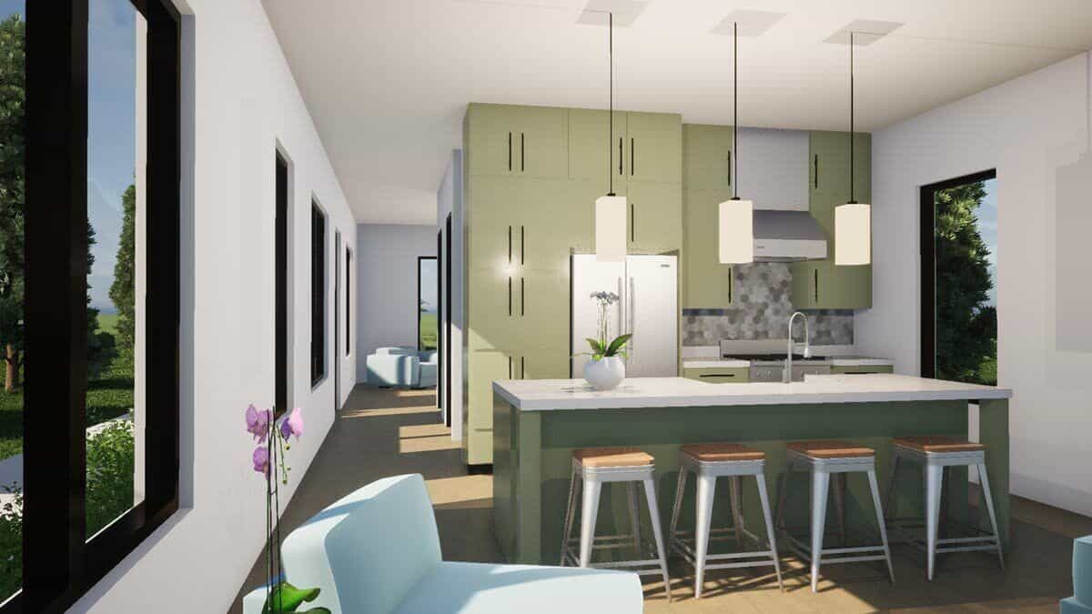 Kitchen with sage green cabinets, stainless steel appliances, and a breakfast island that seats four.