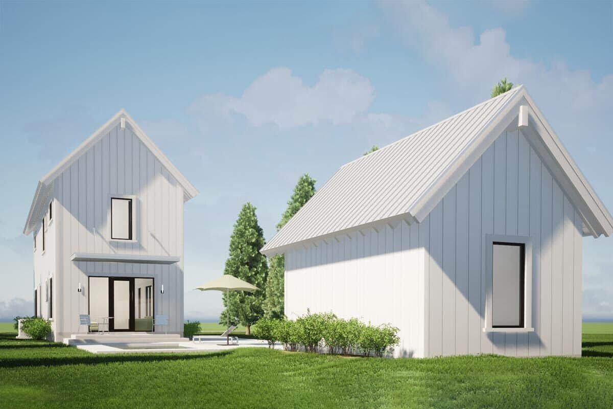 Rear rendering with a concrete patio and a detached garage.