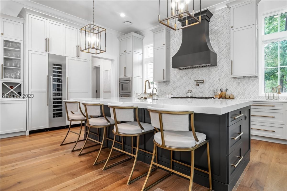 Kitchen with custom cabinetry and custom lighting.
