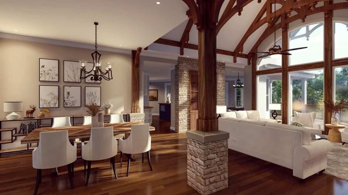 Dining room and great room with hardwood flooring and a wall of windows.