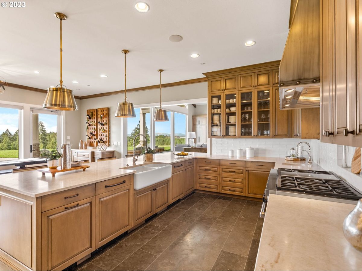 Kitchen with custom lighting and custom cabinetry.