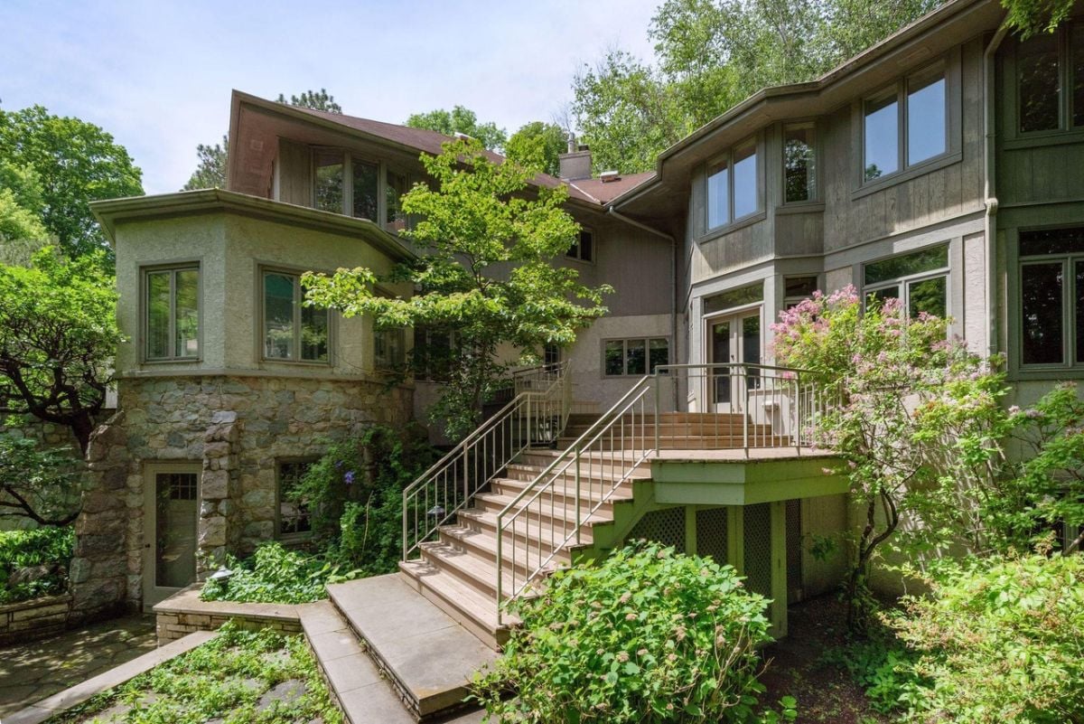 Stone staircase leading up to the backyard.