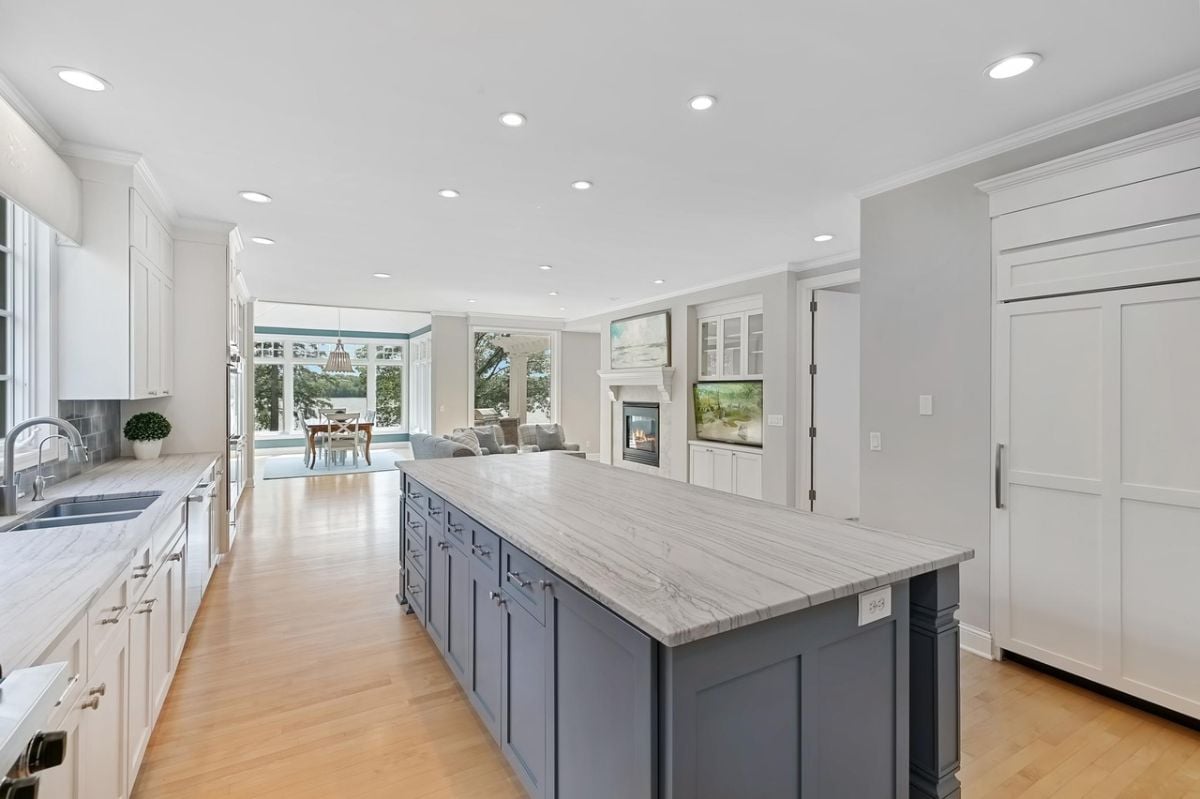 Kitchen with custom cabinetry and custom lighting.