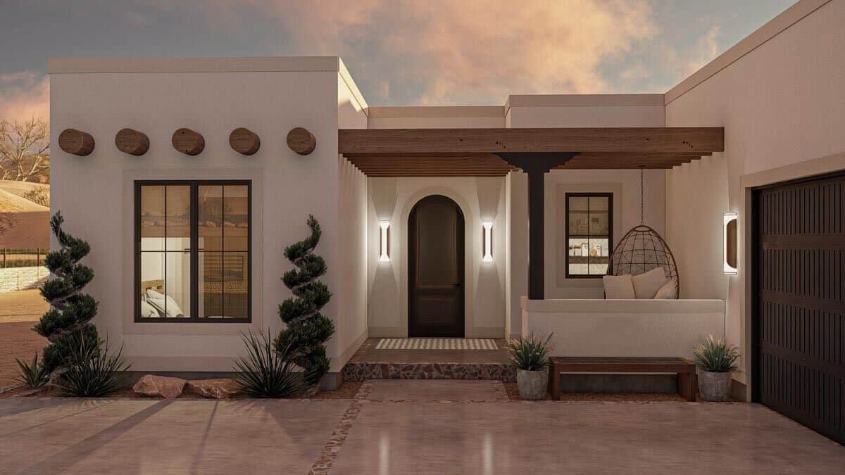 Front porch with trellis porch and an arched entry door.