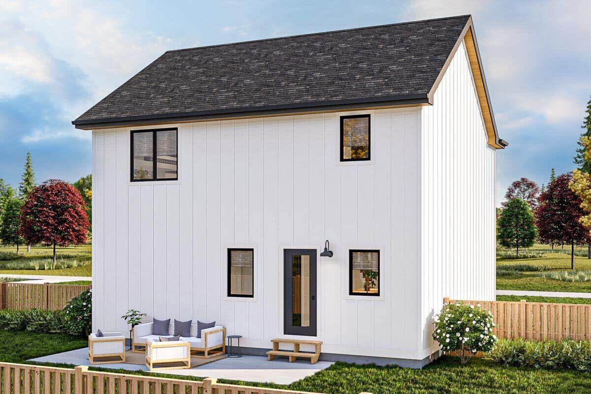 Rear rendering with sliding windows, a glazed door, and an open patio filled with cushioned chairs.