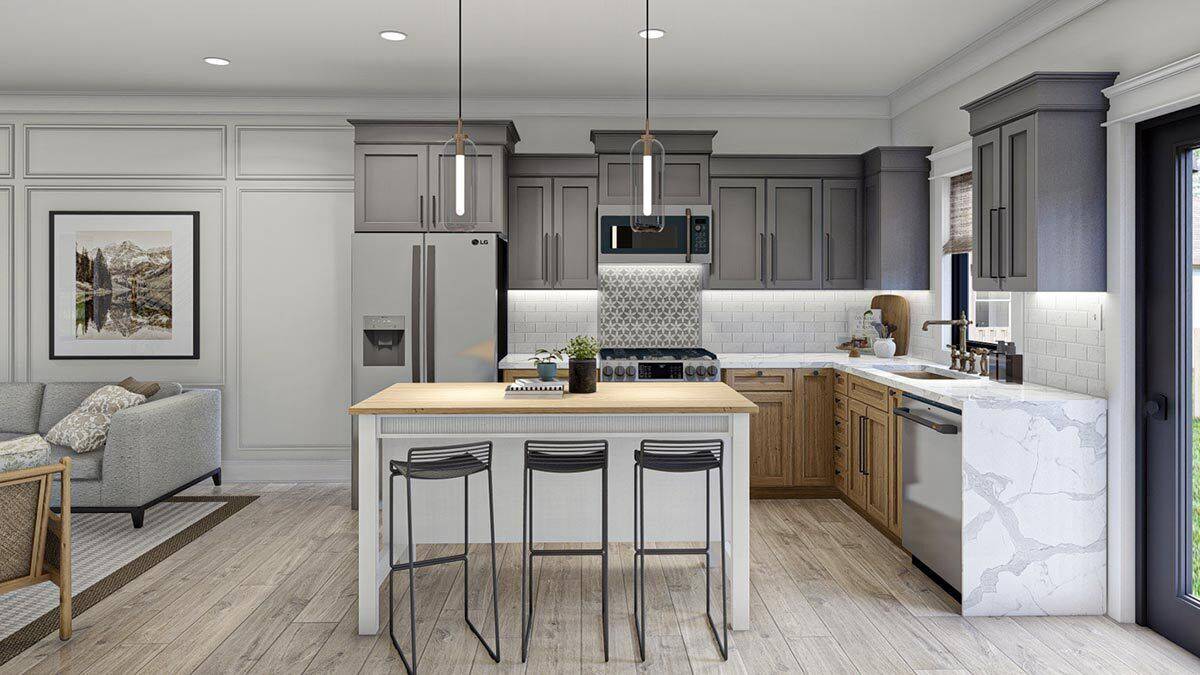 The kitchen includes marble countertops and a bar seating.