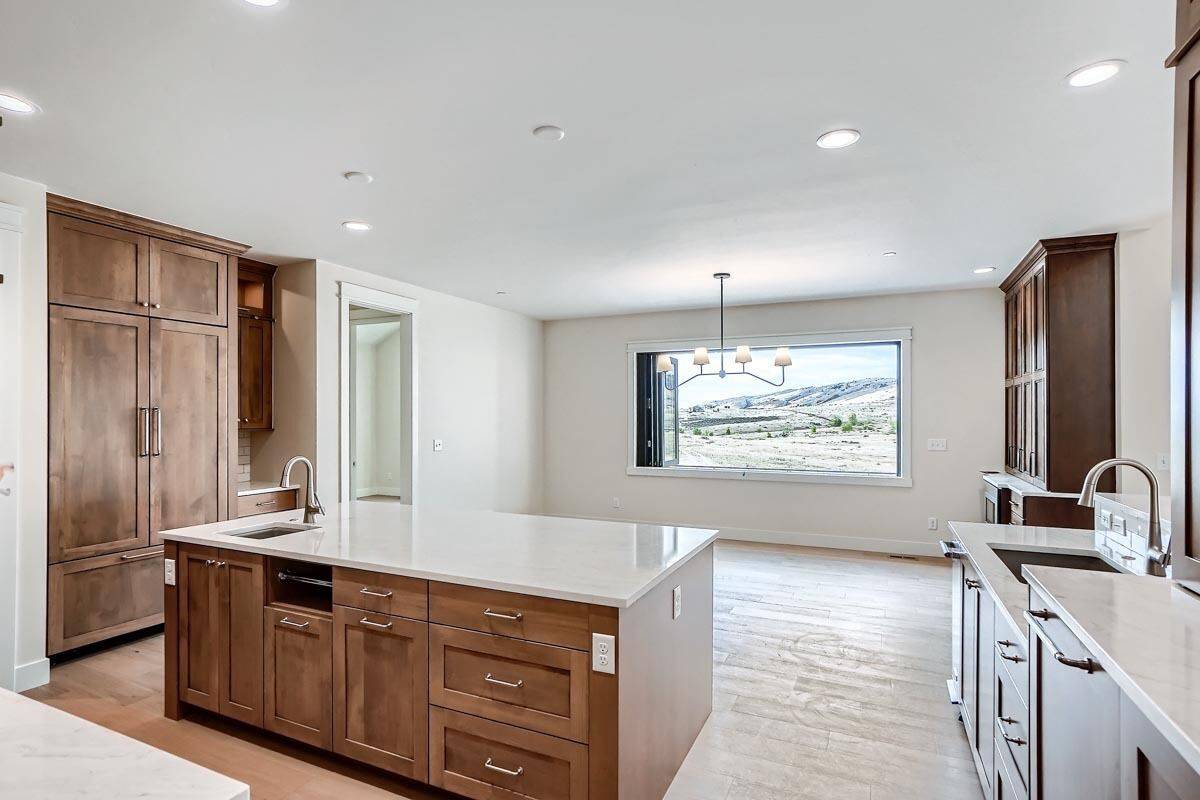 Kitchen island with a small sink overlooking the formal nook.