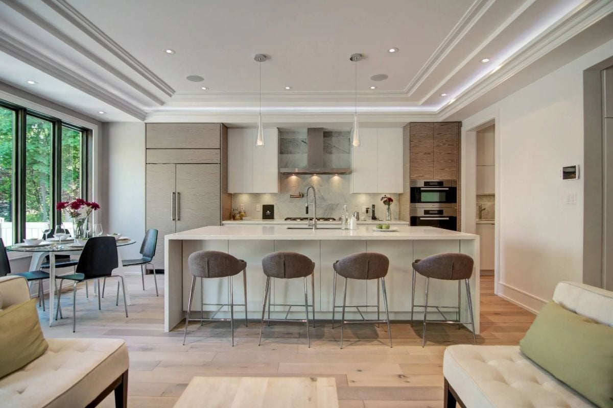 Kitchen with custom cabinetry and custom lighting.