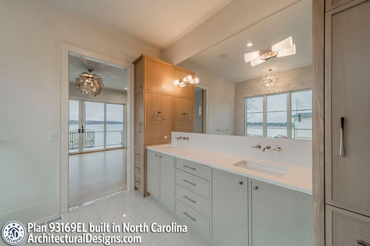 The primary bathroom includes a dual sink vanity and a linen closet.