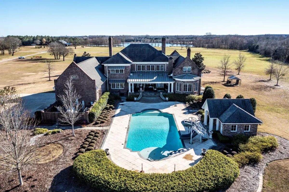 Aerial view of the mansion featuring the pool.