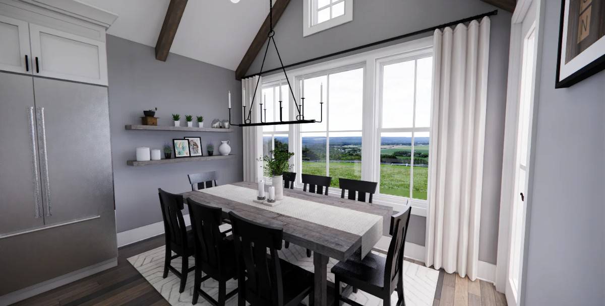 Dining room with a rustic dining set and a trio of windows overlooking the lush backyard.