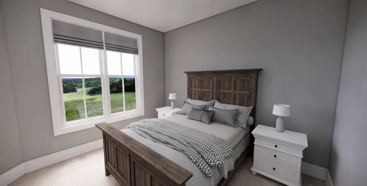 Secondary bedroom with a wooden bed and white nightstands over the carpeted floor.