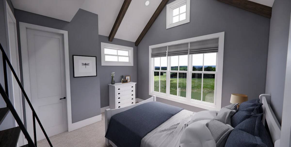 Secondary bedroom with white furnishings under a cathedral ceiling with exposed beams.