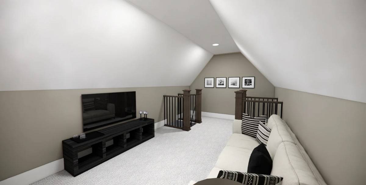 Loft with a vaulted ceiling, a sectional sofa, and a wall-mounted TV.