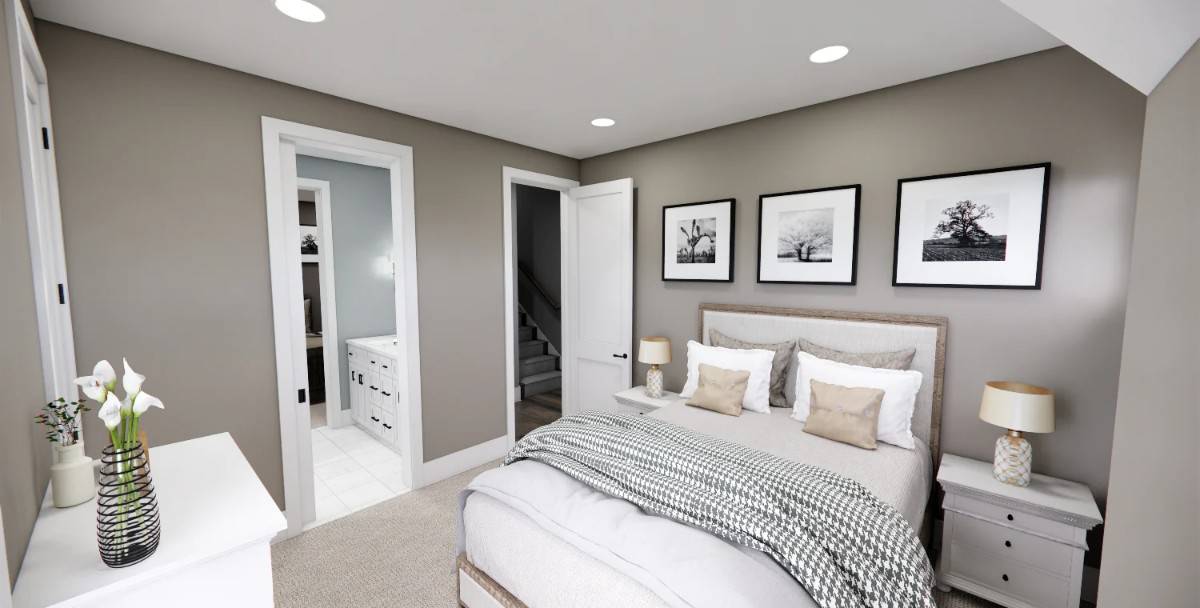 Third bedroom with a wooden bed and full bath access.