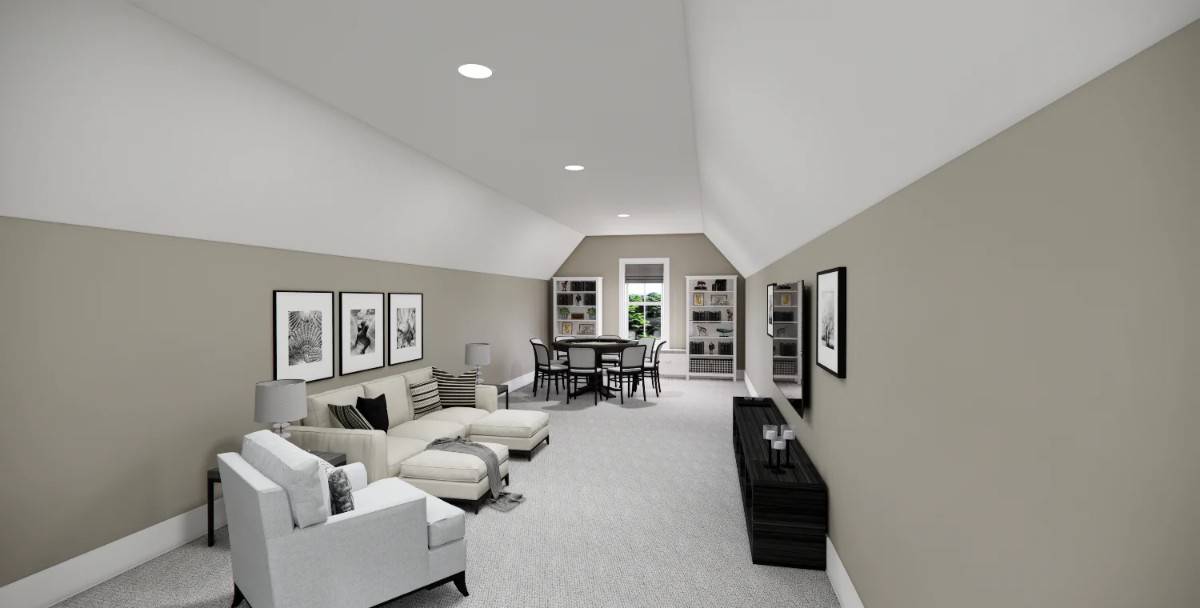 Bonus room with modern sofas, a poker table, and two shelving units under a coved ceiling.