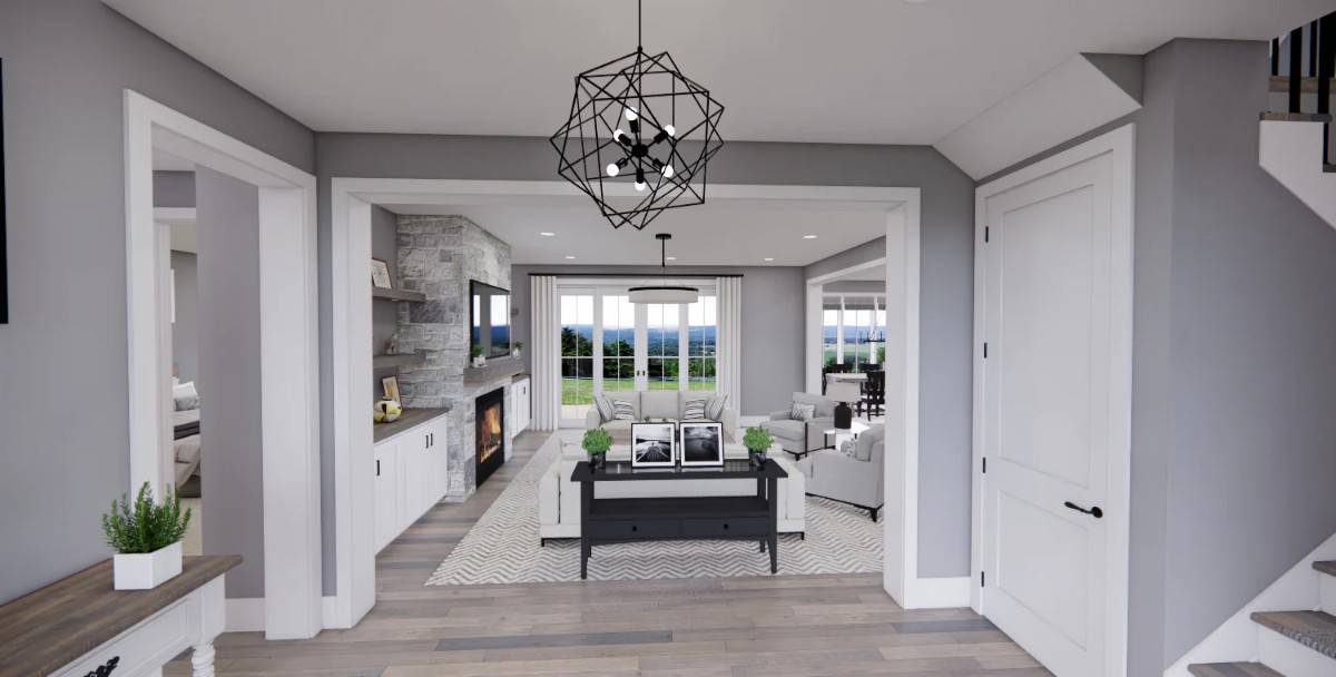 Foyer with a geometric chandelier and views of the great room.