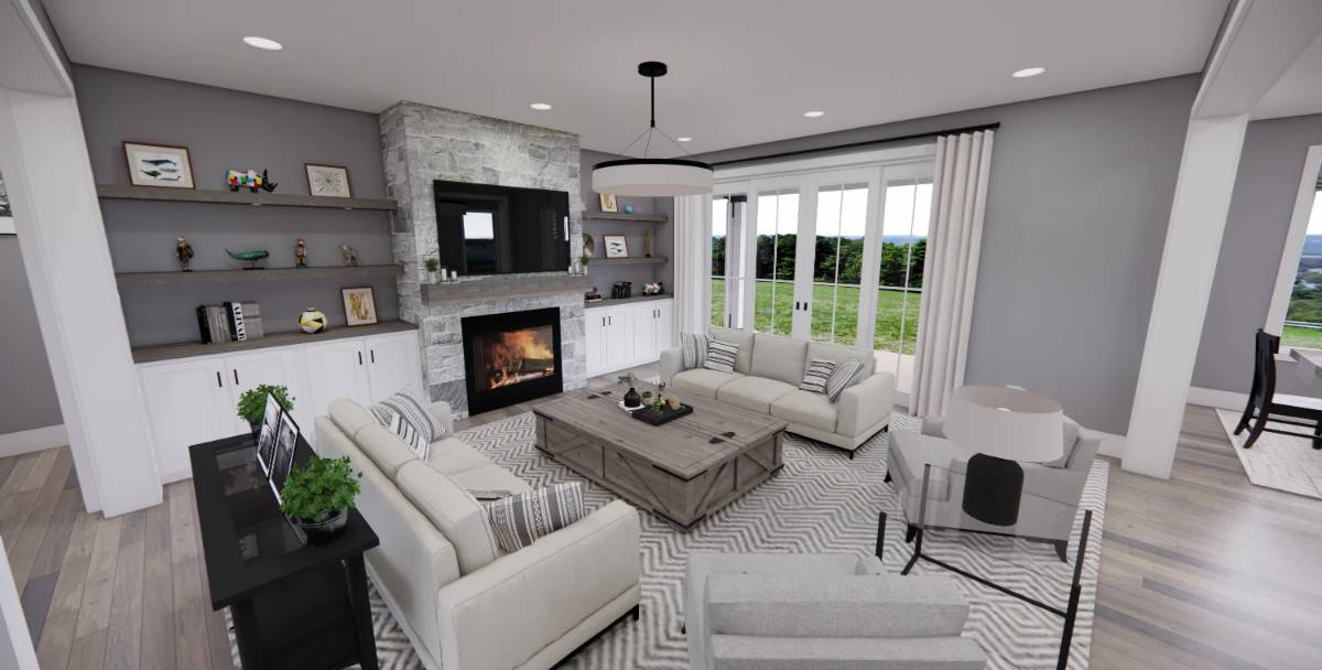 Great room with facing sectionals, gray armchairs, and a stone fireplace flanked by floating shelves and base cabinets.