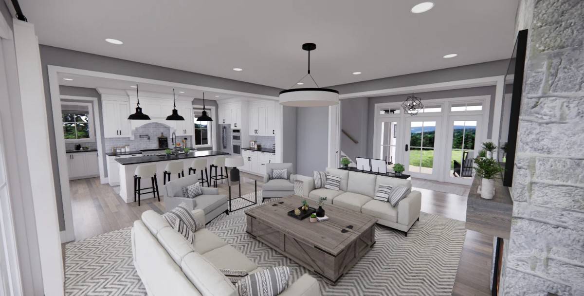 Oversized openings connect the great room to the kitchen and foyer.