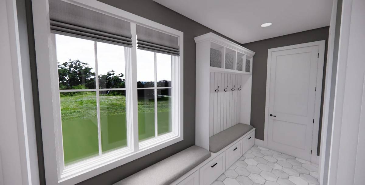 Mudroom with cushioned benches, coat hooks, and built-in cubbies.