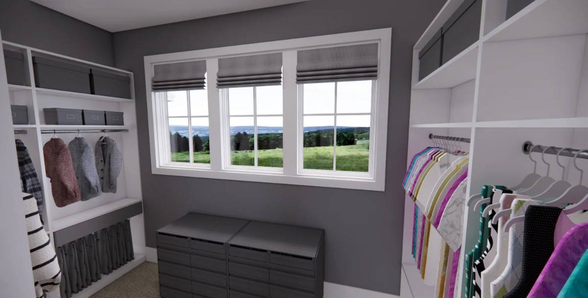 Primary walk-in closet with white built-ins and a storage bench under the white-framed windows.
