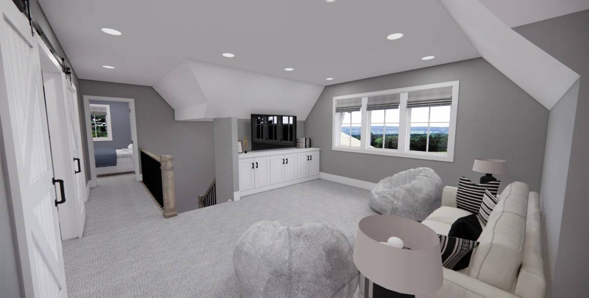 Loft with a beige sofa, bean chairs, and a TV sitting on the white console table.