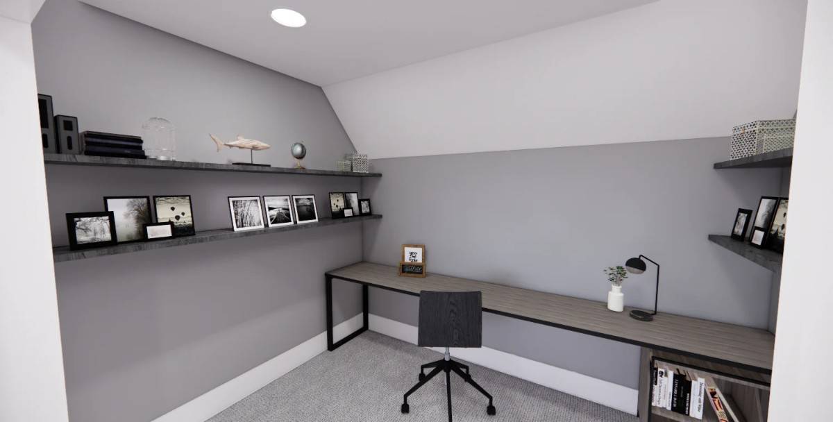 Study with an elongated desk and floating shelves under a vaulted ceiling.