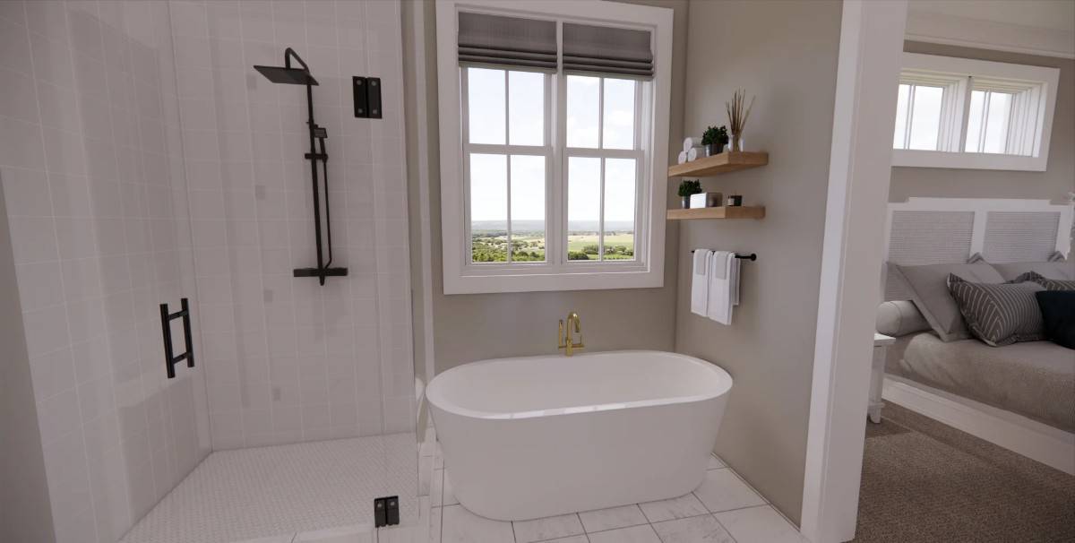 The primary bathroom includes a tiled shower and a freestanding tub brightened by a white-framed window.
