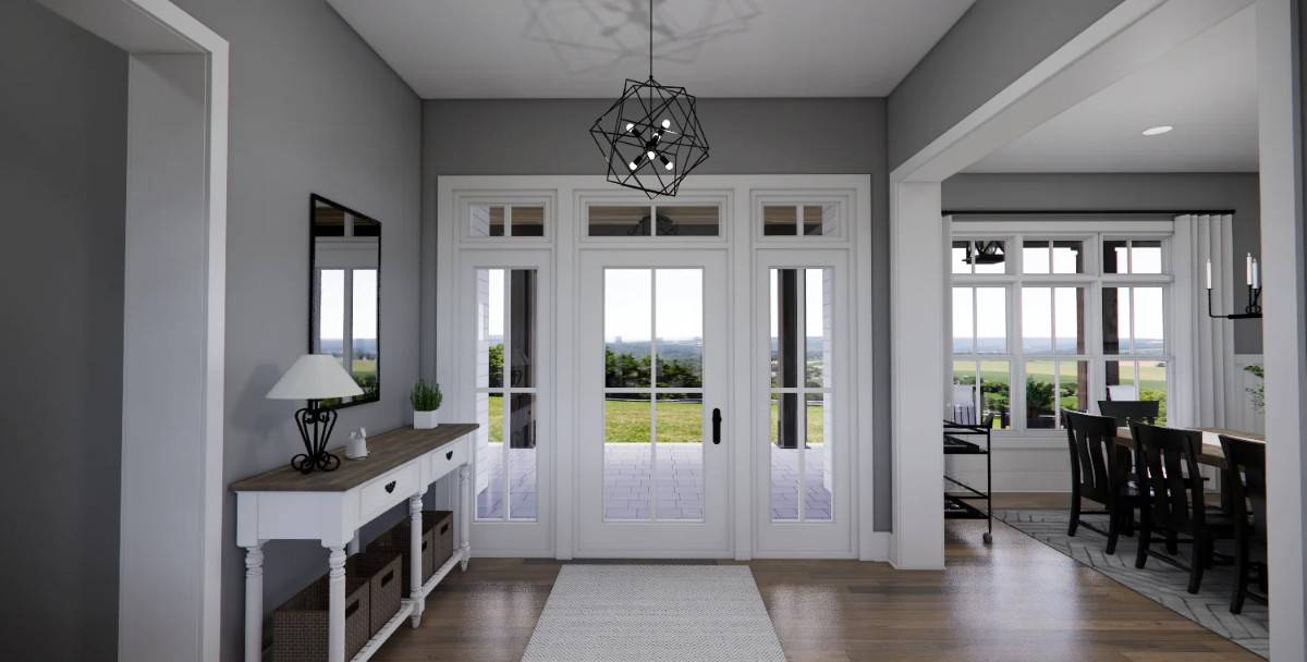 The foyer includes a glazed front door and a wooden console table topped with a framed mirror.