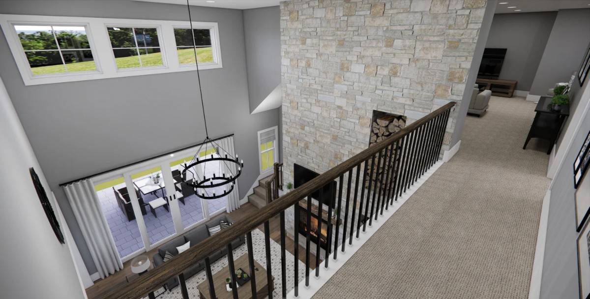 Balcony with wrought iron railings overlooking the great room.