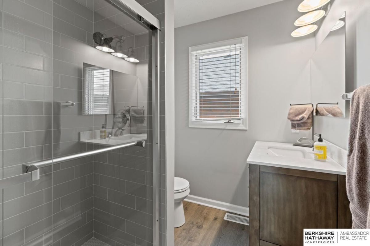 Bathroom's shower and toilet.