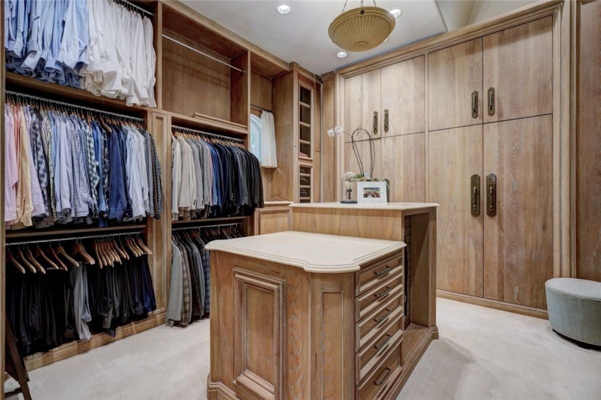 Walk-in closet for him.