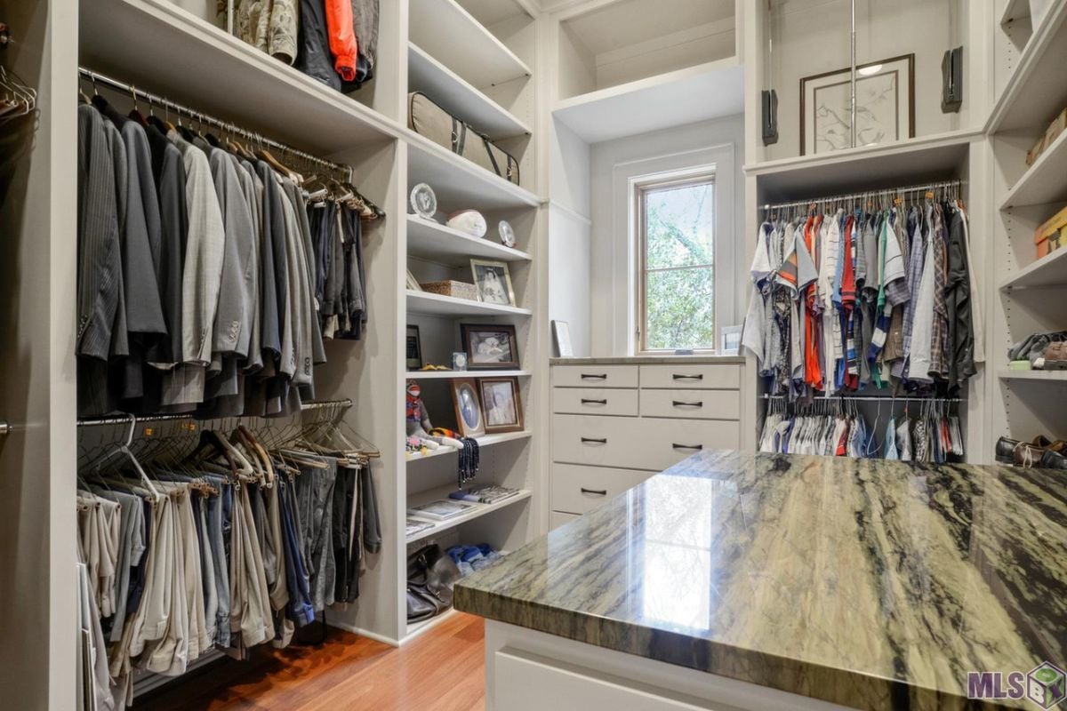 Dresses in the walk-in closet.