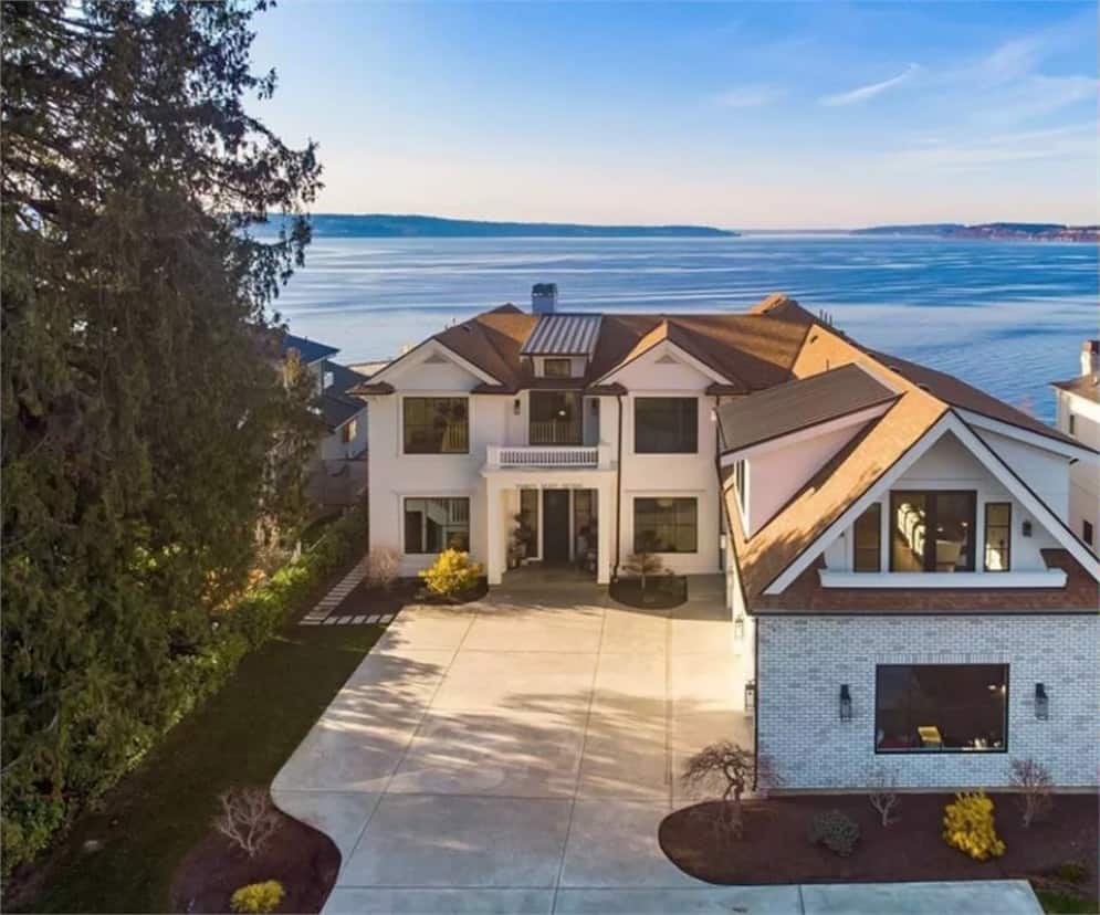 Aerial front view of the coastal craftsman home.