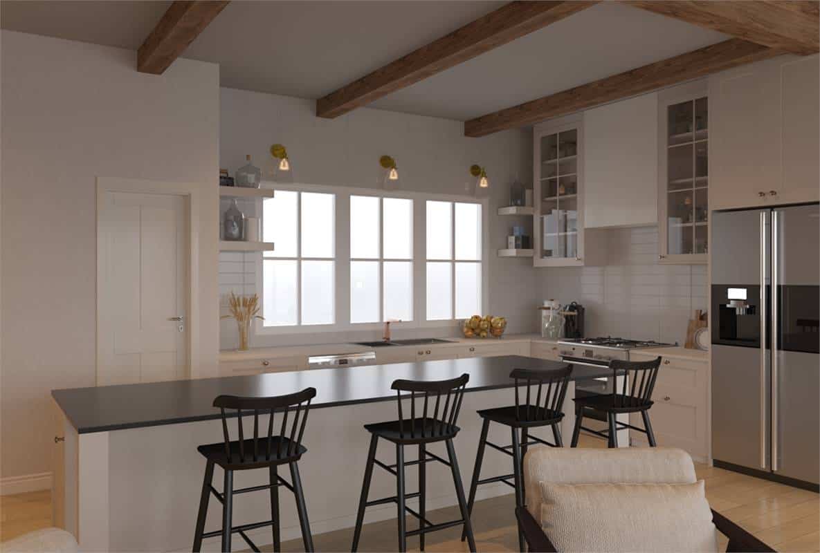 Kitchen with modern appliances, white cabinets, and a breakfast island under a beamed ceiling.