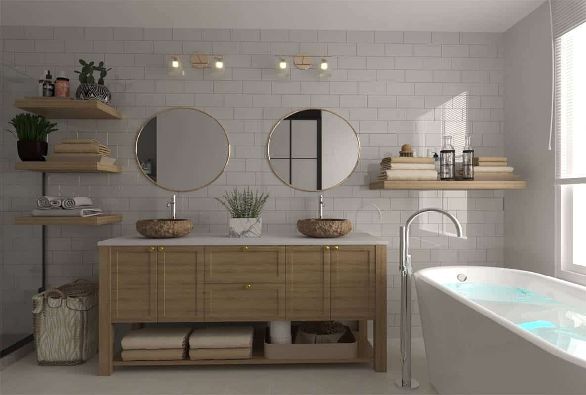 Primary bathroom with a soaking tub and a dual sink vanity topped with vessel sinks and round mirrors.