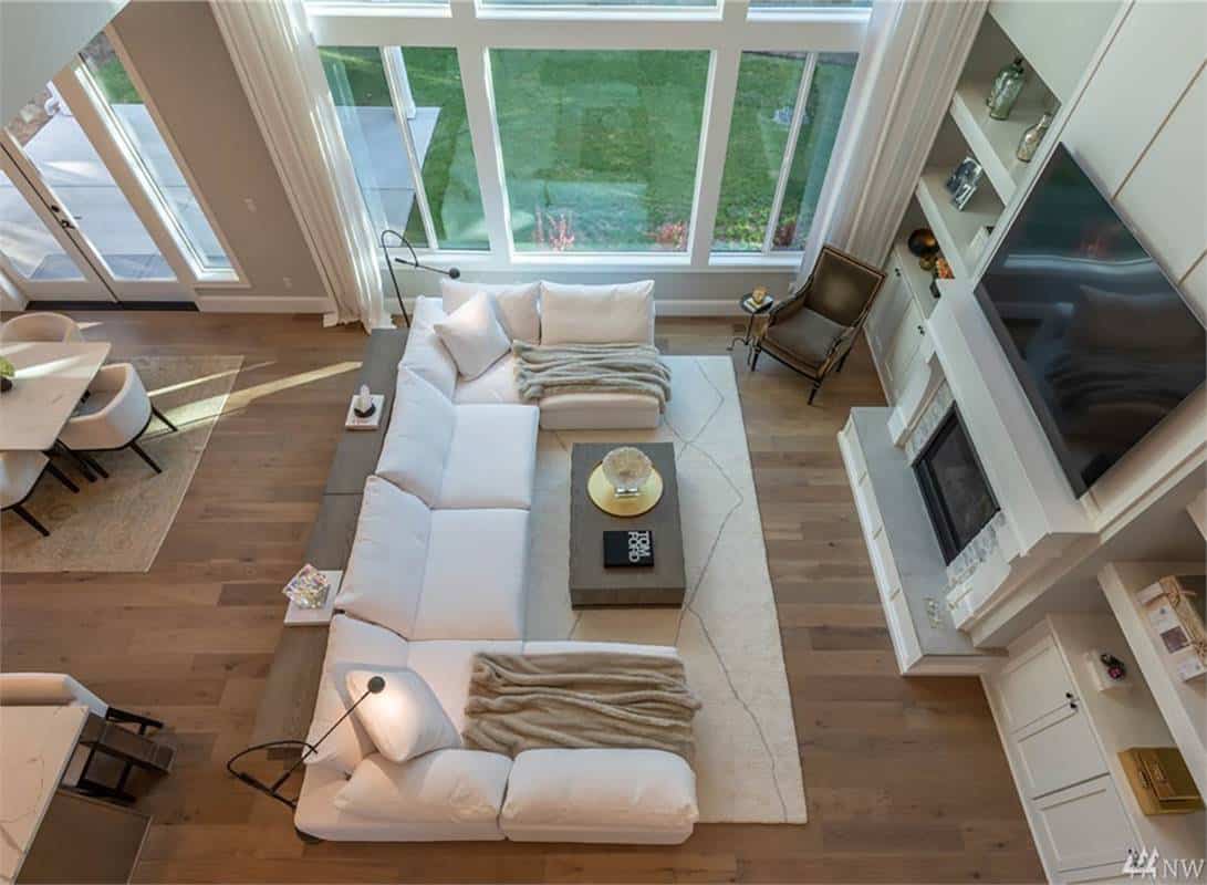 A view of the bright great room from the second-level balcony