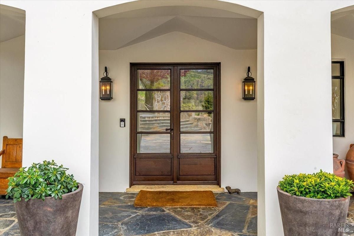 Porch with front entry door.