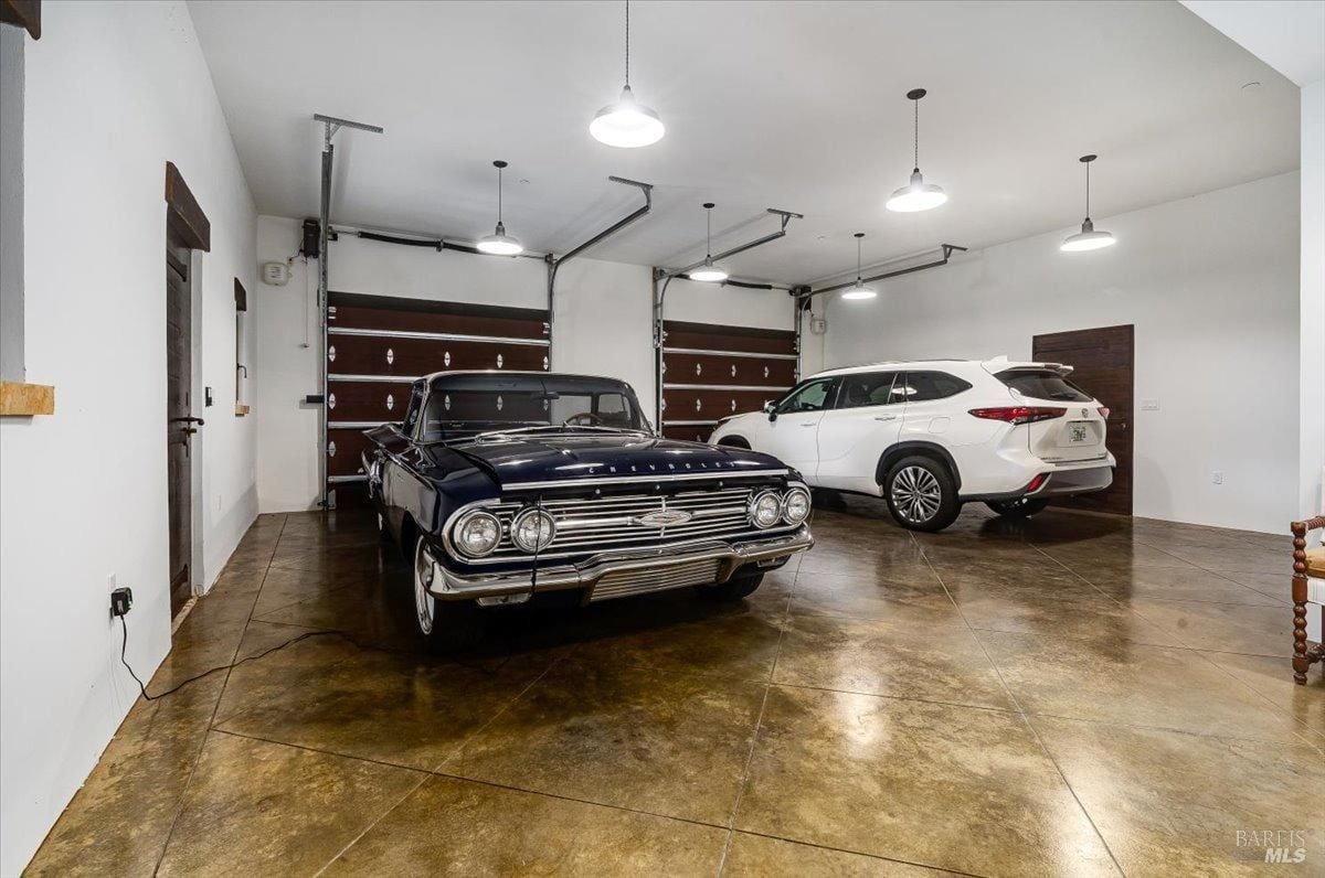 Garage with automatic garage door opener.