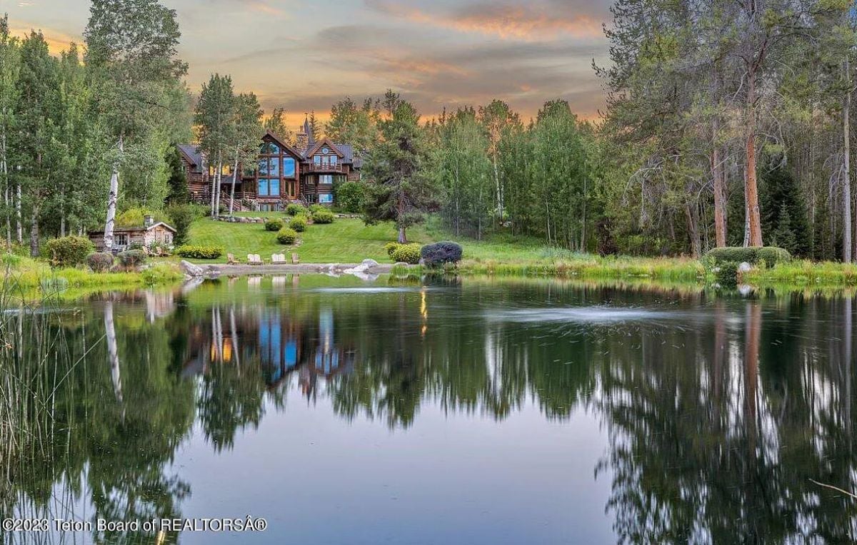 Rear view of the house with a pond.