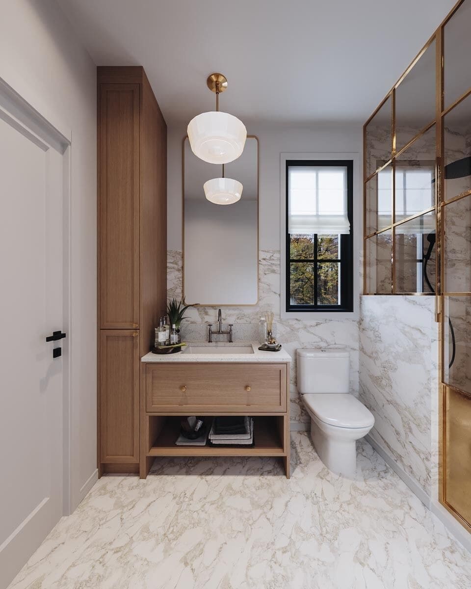Primary bathroom with a sink vanity, a toilet, and a tiled shower.