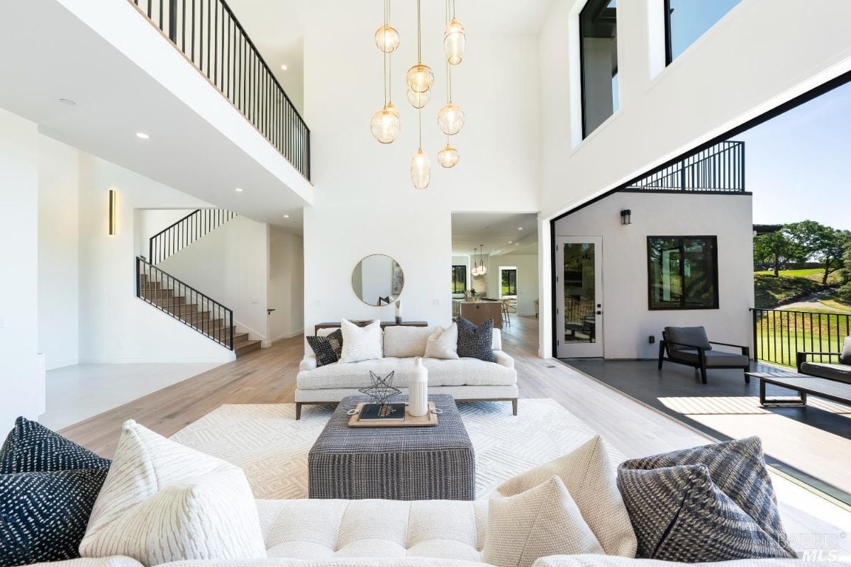 Living room features the center table, couch and the