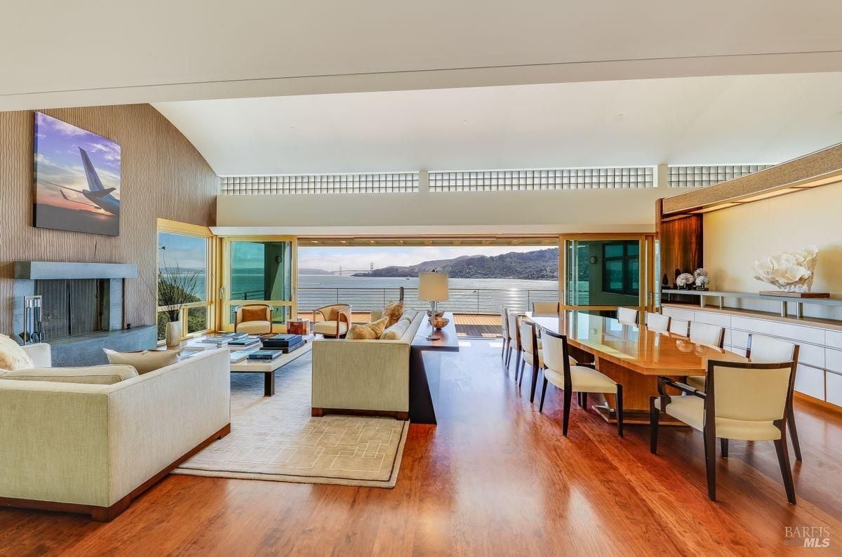 Great room features the living room, dining area and the house' deck.
