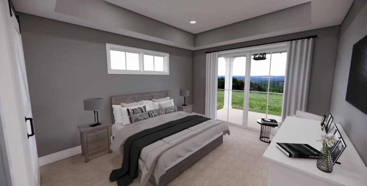 Primary bedroom with a wooden bed, a tray ceiling, and sliding glass doors that open onto the back porch.