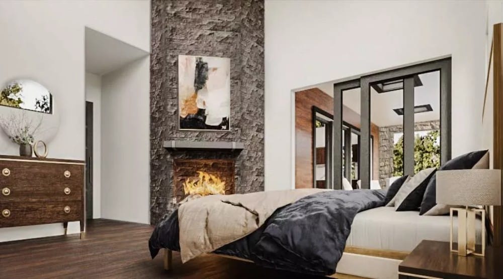 Primary bedroom with a corner fireplace and covered patio access.