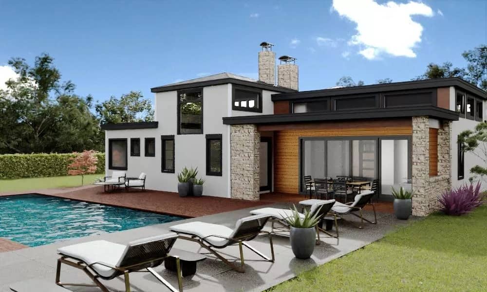 Rear-left view with stone chimneys, a covered patio, and sun loungers complementing the swimming pool.