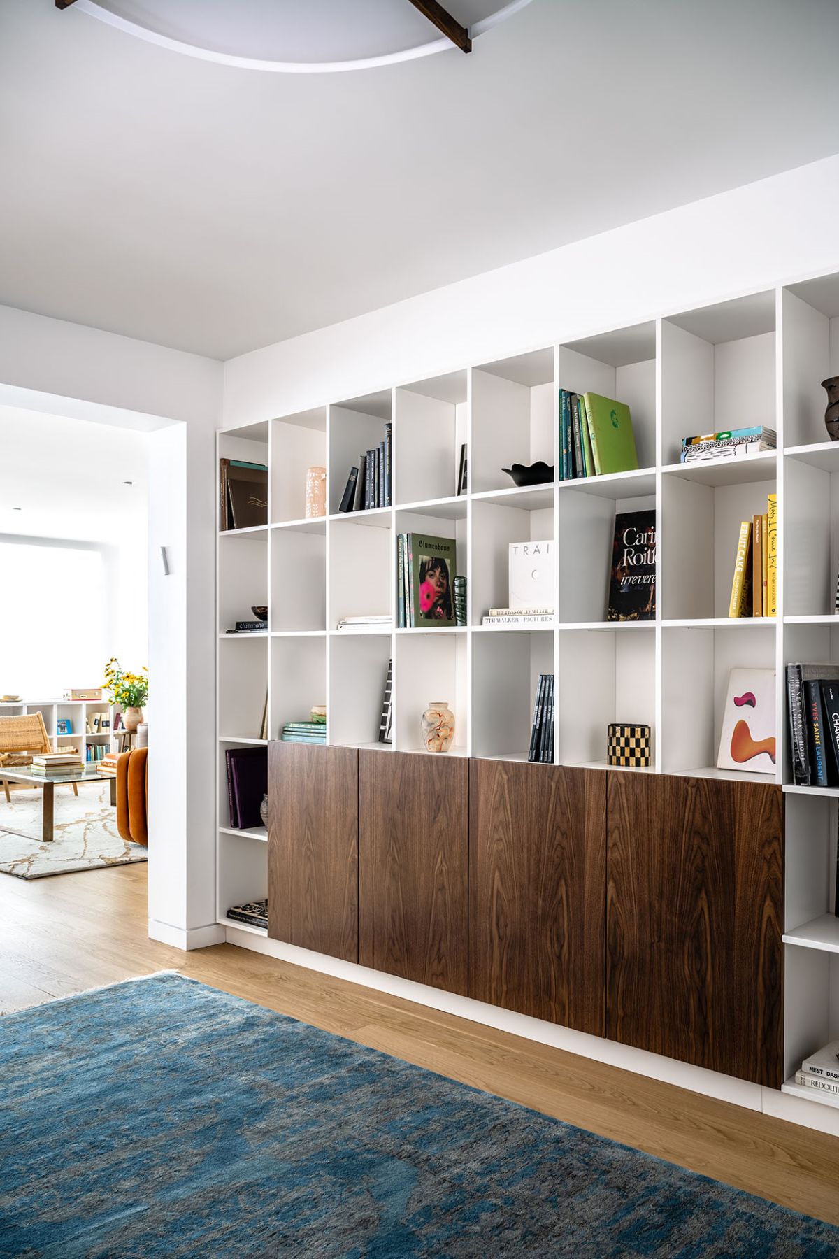 A foyer features a bookshelf